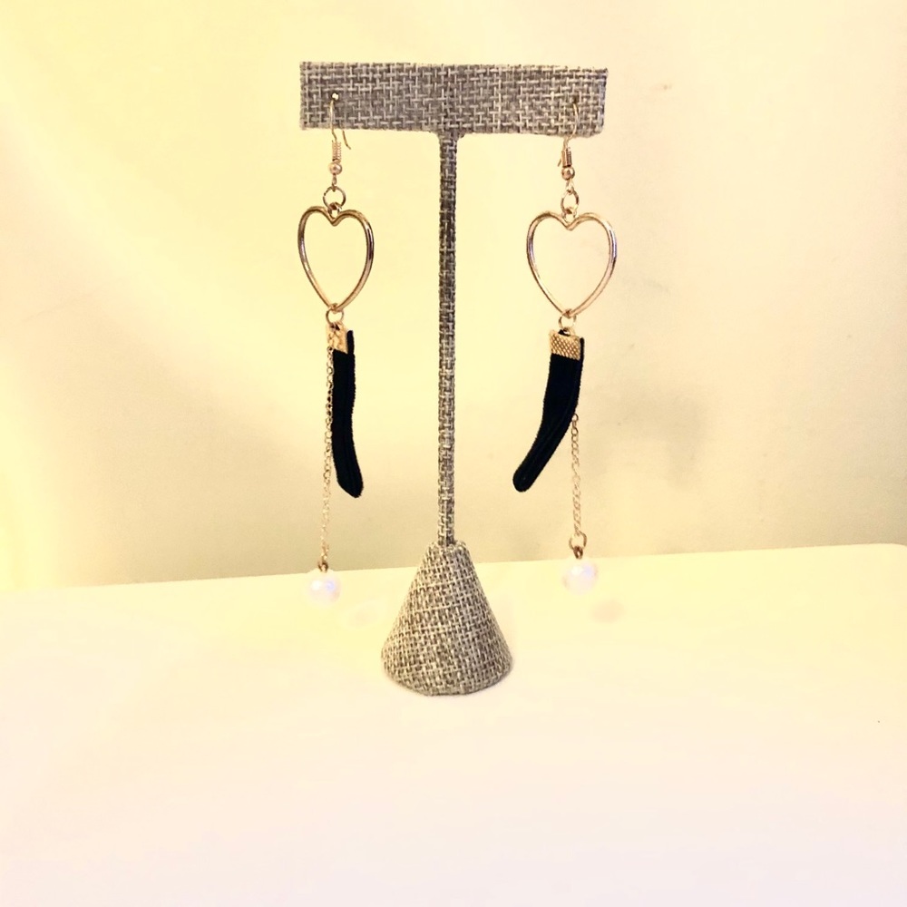 - Long fashion gold earrings
